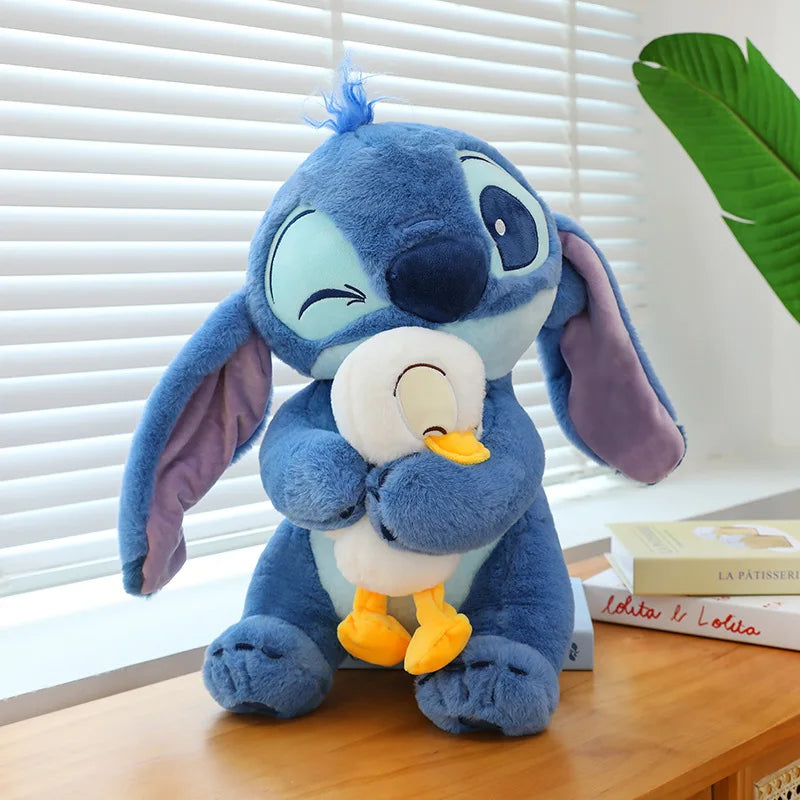 Pelúcia Stitch e Baby Donald - Edição Disney